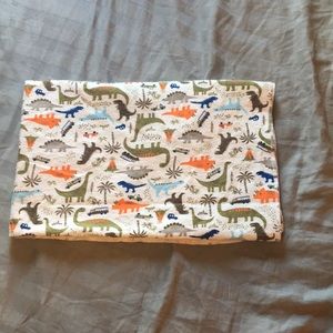 A dinosaur baby boy light blanket wrap